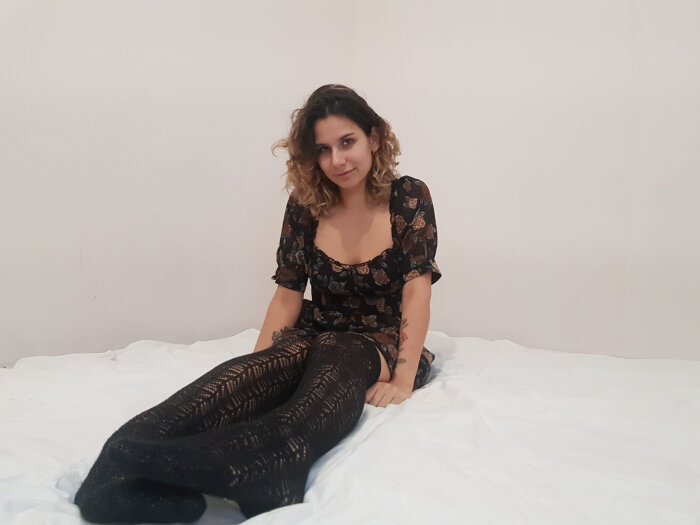 Beautiful naked girl shows her pussy close up