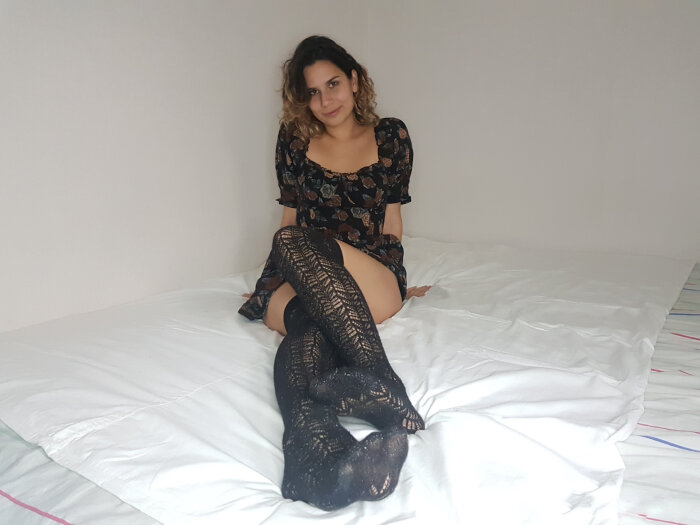 Beautiful naked girl shows her pussy close up