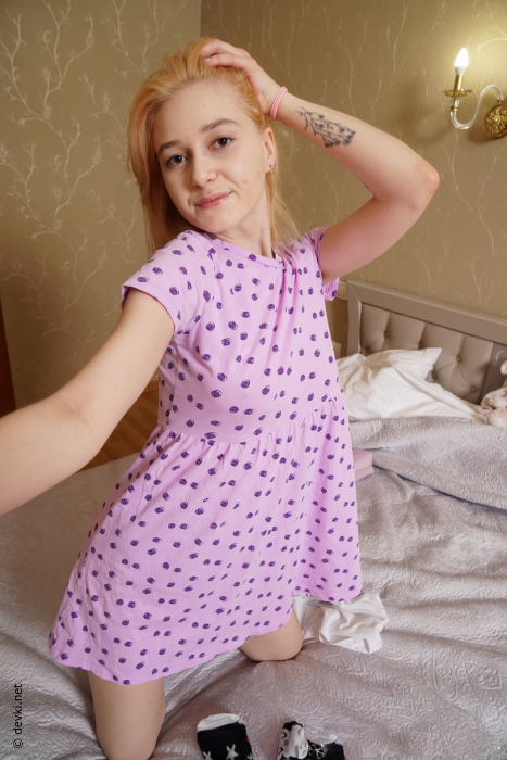 Natural blonde with great tits gets nude