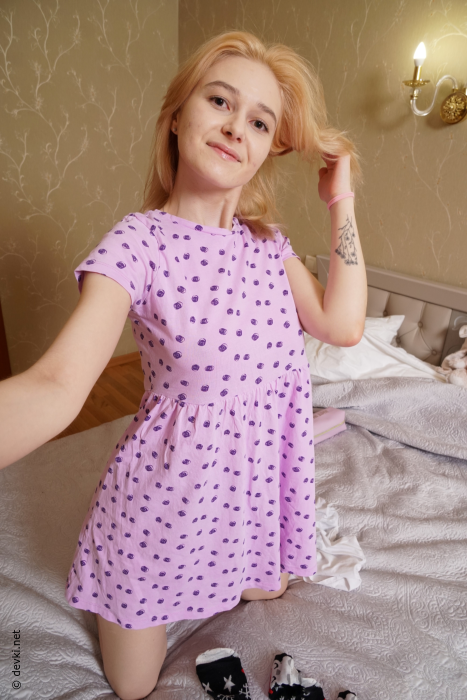 Natural blonde with great tits gets nude