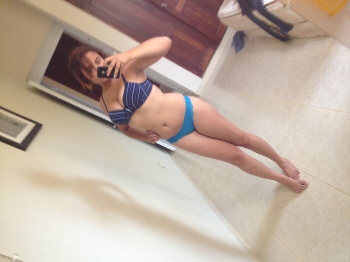 Sexy selfies of young Latina with perky tits and nice ass
