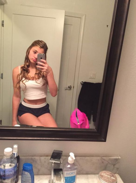 Cute blonde with perky breasts