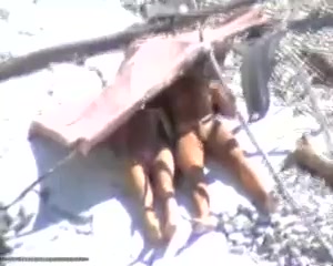 Wife gives blowjob on public beach