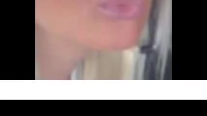 Sexy blonde woman doing deepthroat on a black cock