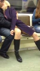 A couple has sex in a public subway