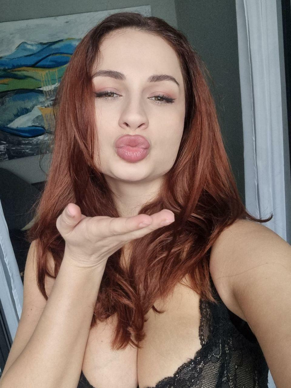 Kiss for you from a red-haired beauty