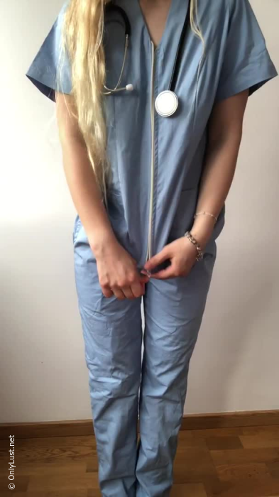 Stripped down to show what she looks like under her medical uniform