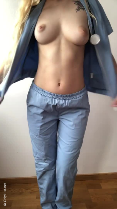 Stripped down to show what she looks like under her medical uniform