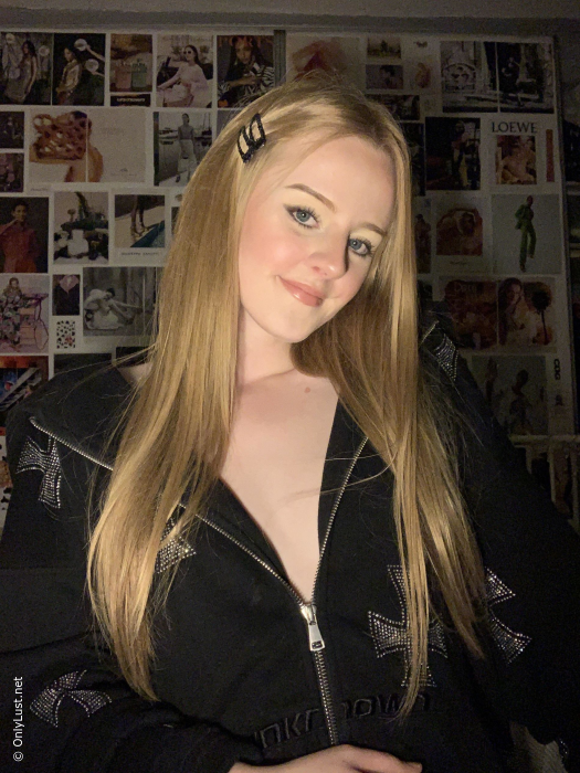 Takes a selfie and shows off her young body