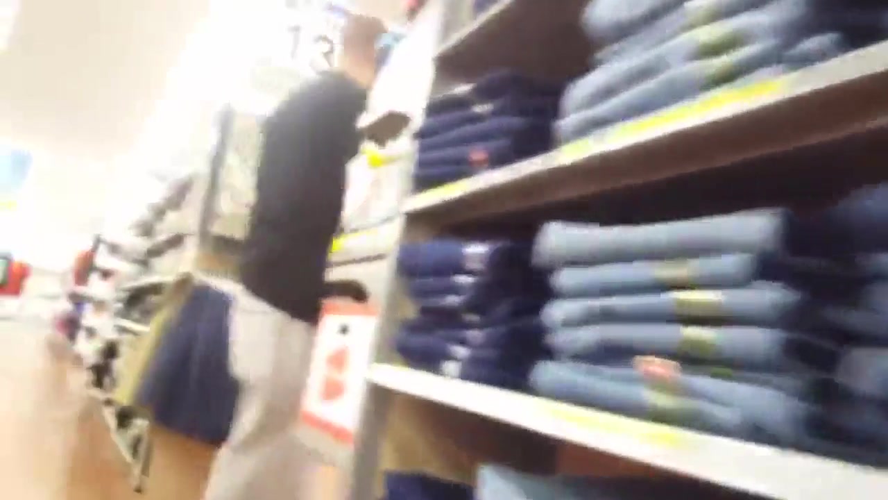 Exhibitionist woman in a public store