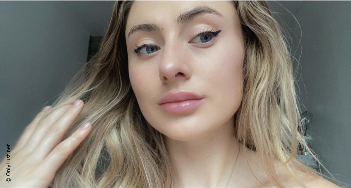 Takes a selfie showing her attractive breasts and her sexy body