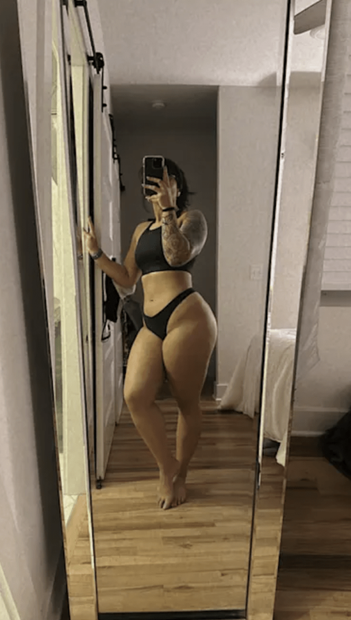 Tattooed Cuban queen got it thick .
